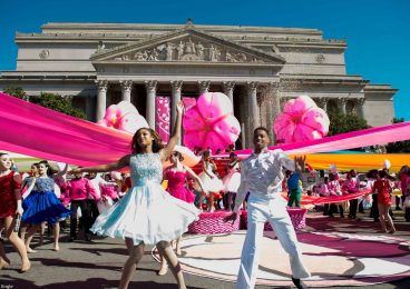 two people dancing at national cherry blossom festival parade at National Archive